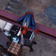 Pressing square at an enemy while hidden up in the rafters or on an I-beam will tie them up and keep them out of the way.